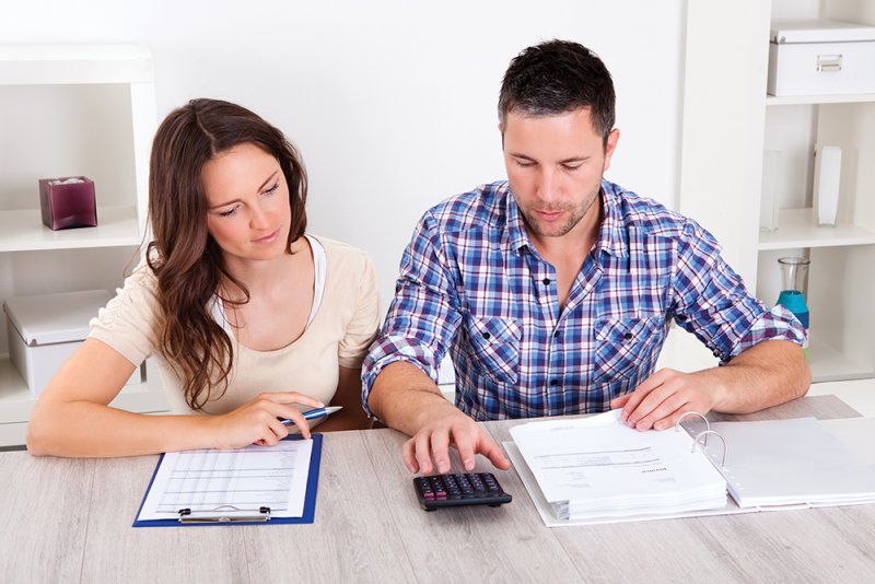 Young couple working on finances